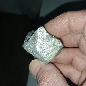 Rough, uncut, black natural diamond.